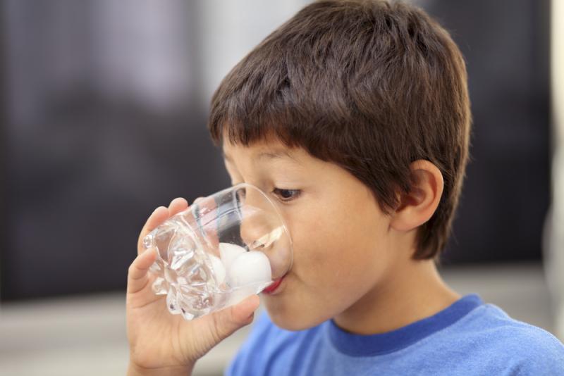 a kid eating Ice