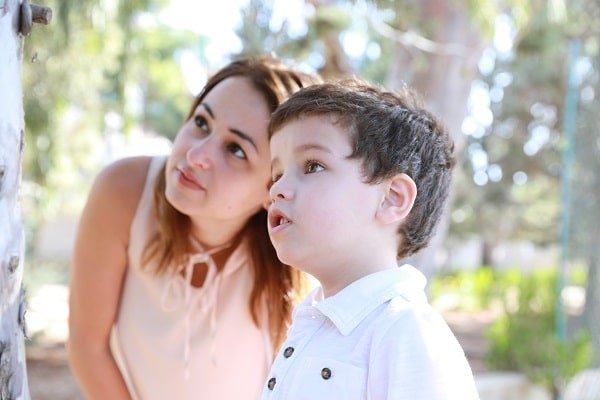 mom and her kid in the garden